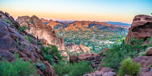 Hikers enjoying panoramic views at Camelback Mountain in Phoenix.